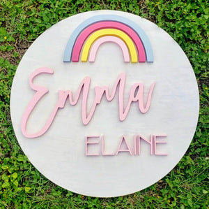 23" round sign with a charming and simple rainbow design, allowing for personalization to represent meaningful elements in your kids' rooms or complement cute and versatile room themes.